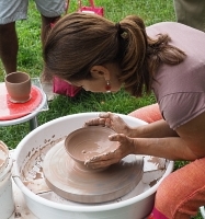 pottery demo by debra griffin's student at the ashland farmers market in Ashland, MA